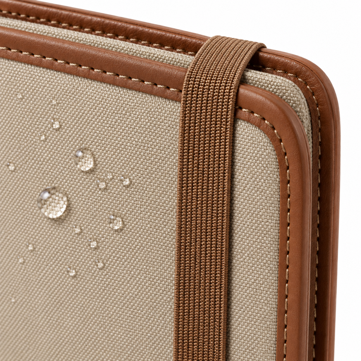 Canvas & Leather Travel Passport Wallet - close up of water-resistant canvas surface with water droplets